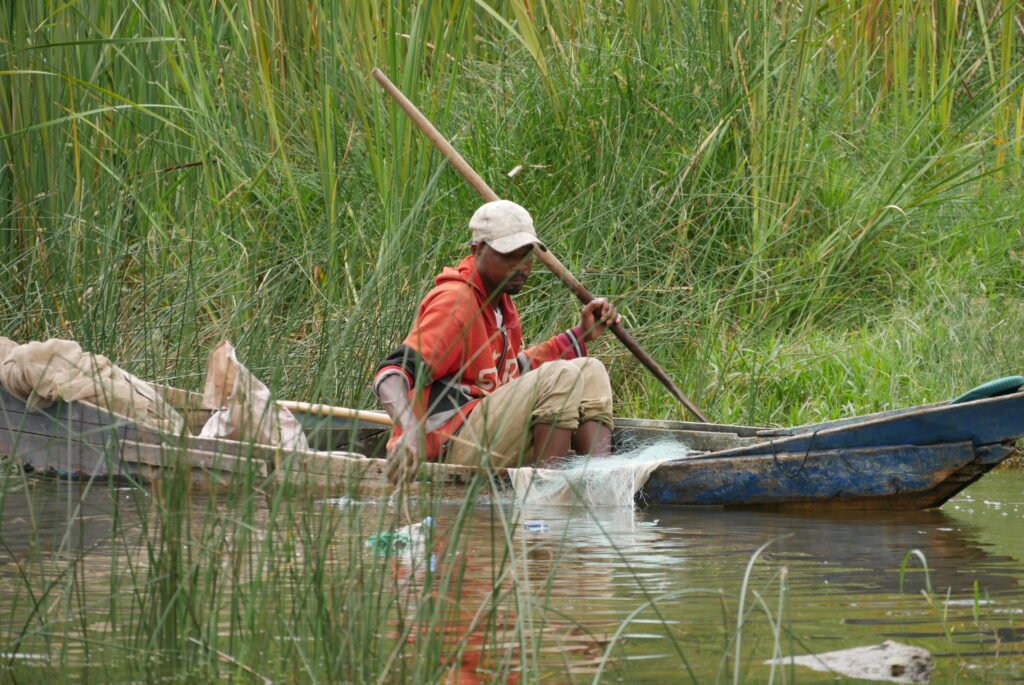 Local fishermen in lake kivu a must do Experience in Rwanda, what to do in Rwanda lake kivu tourists attraction in Rwanda