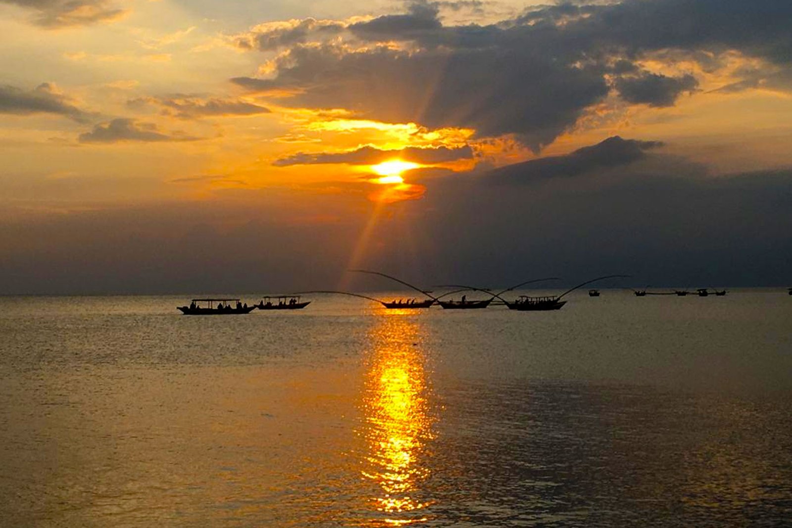 Sunset tour in lake kivu with fishermen songs